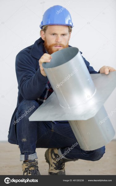 depositphotos_481283238-stock-photo-man-holding-metal-chimney-flue.jpg