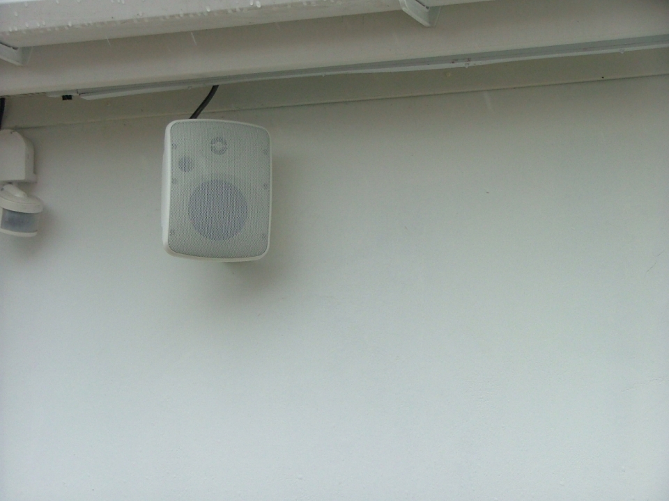 White speaker outside