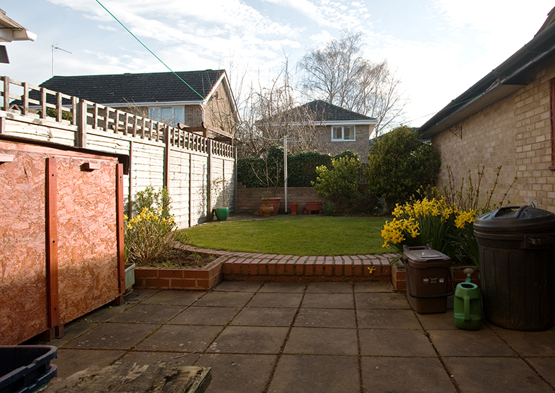 rear garden looking east. On the south side is the rear of the garage/workshop